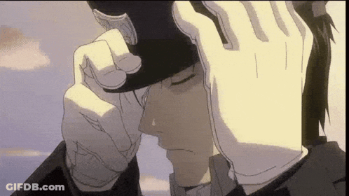 Man In Hat And Gloves Crying Holding Head GIF