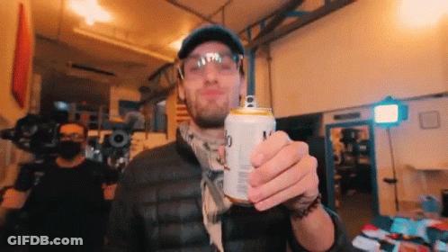 Man In Hat And Goggles Holding Beer GIF