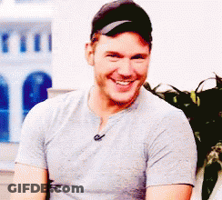 Man In Hat And Gray Shirt Smiling GIF