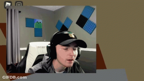 Man In Hat And Headphones On Evoxx Chair GIF