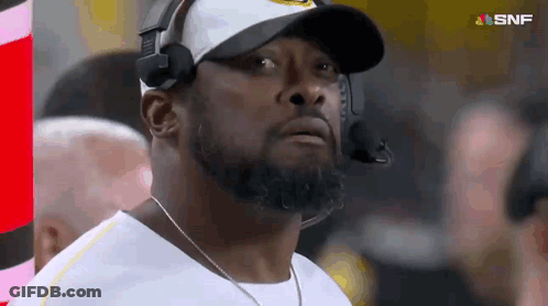 Man In Hat And Headphones Watching Football GIF