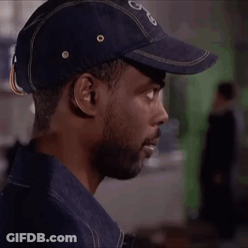 Man In Hat And Headset Saying Racist GIF