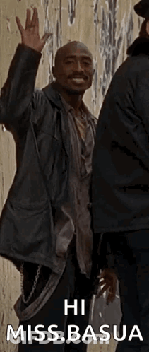 Man In Hat And Hoodie Looking Out Window GIF