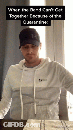 Man In Hat And Hoodie Saying AE GIF