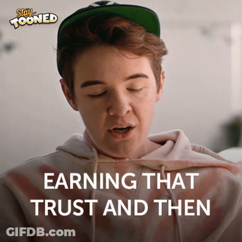 Man In Hat And Hoodie Saying Earning That Trust And Then GIF