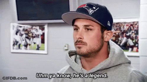 Man In Hat And Hoodie Talking Football GIF