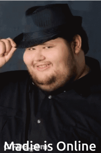 Man In Hat And Jacket Dancing In Club GIF
