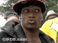 Man In Hat And Jacket Making Face GIF