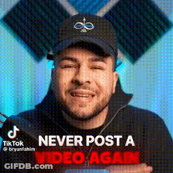 Man In Hat And Jacket Making Funny Face GIF