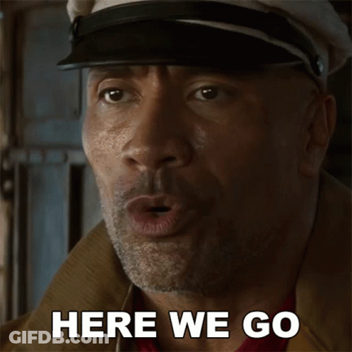 Man In Hat And Jacket Saying Here We Go GIF