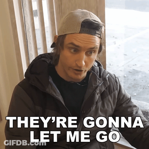 Man In Hat And Jacket Saying They're Gonna Let Me Go GIF