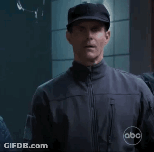 Man In Hat And Jacket With ABC Logo GIF