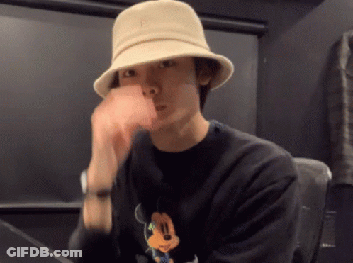 Man In Hat And Mickey Mouse Sweater GIF