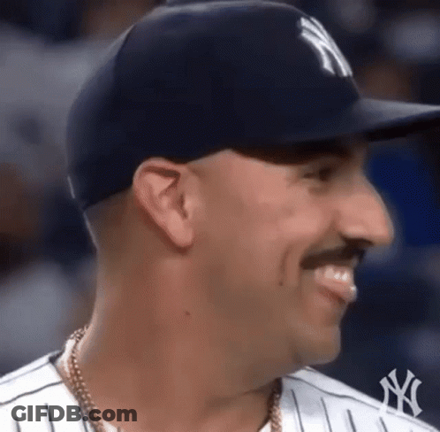 Man In Hat And Mustache Smiling GIF