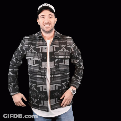 Man In Hat And Native American Pattern Jacket GIF