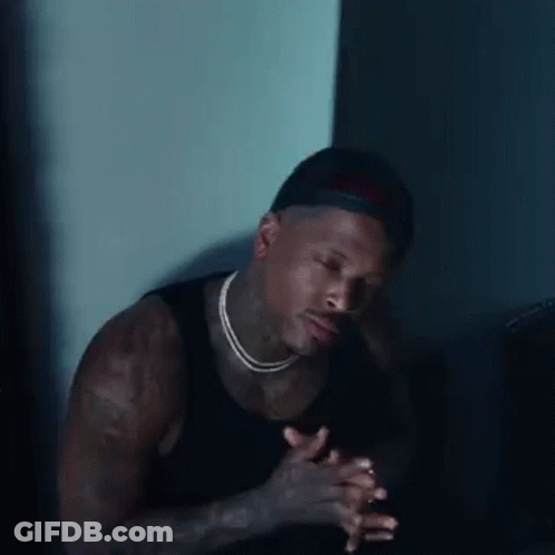 Man In Hat And Necklace Praying GIF