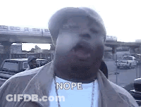 Man In Hat And Necklace Saying Nope GIF