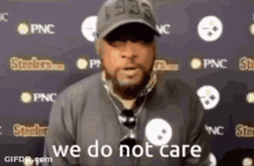 Man In Hat And Necklace Says We Do Not Care GIF