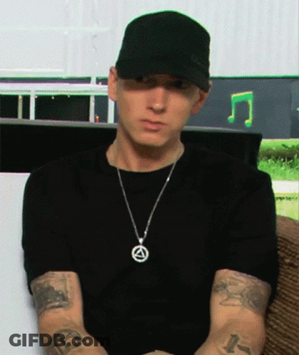 Man In Hat And Necklace With R Tattoo GIF