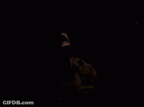 Man In Hat And Pink Shirt Talking Into 98.7 FM Microphone GIF