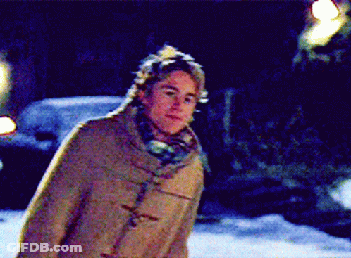 Man In Hat And Scarf Standing In Snow GIF