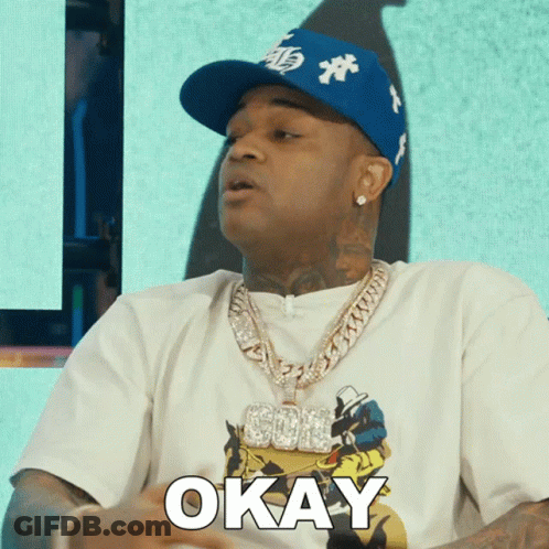 Man In Hat And Shirt Saying Okay GIF