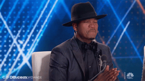 Man In Hat And Suit At Microphone World Of Dance GIF