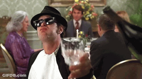 Man In Hat And Sunglasses Holding Wine GIF