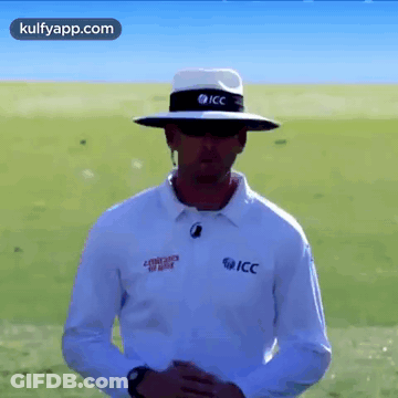 Man In Hat And Sunglasses In Field GIF