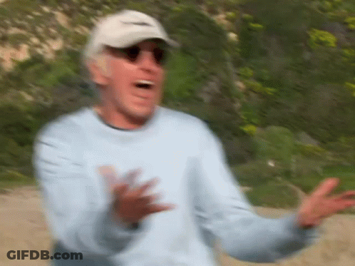 Man In Hat And Sunglasses On Beach GIF
