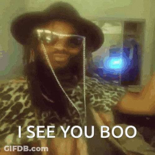 Man In Hat And Sunglasses Saying I See You Boo GIF