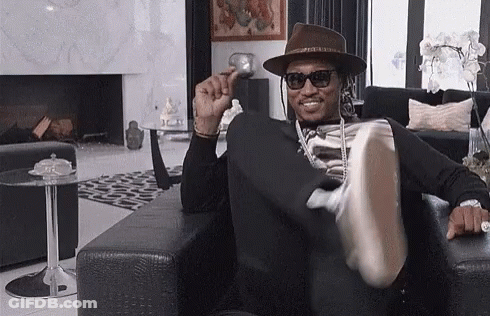 Man In Hat And Sunglasses Sitting GIF
