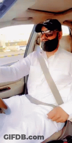 Man In Hat And Sunglasses Sitting In Car With Seatbelt GIF