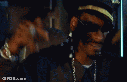 Man In Hat And Sunglasses Sitting GIF