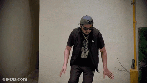Man In Hat And Sunglasses With Number 9 On Shirt GIF
