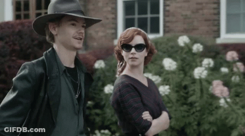 Man In Hat And Sunglasses With Woman Sunglasses GIF