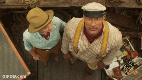 Man In Hat And Suspenders And Woman In Blue Shirt GIF