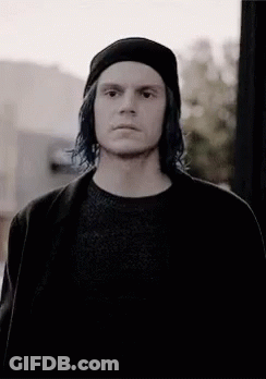 Man In Hat And Sweater Black And White Photo GIF