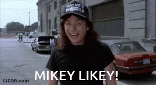 Man In Hat And T-Shirt On Street GIF