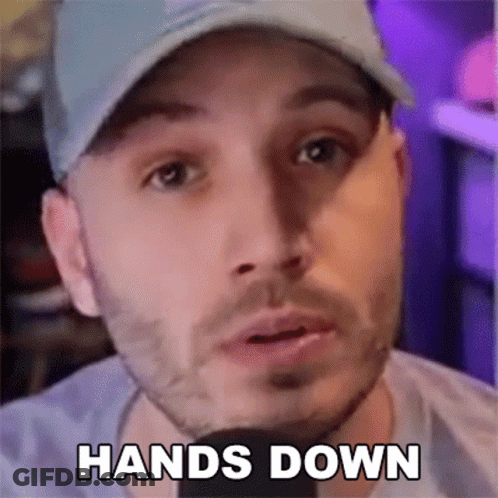 Man In Hat And T-Shirt Saying Hands Down Into Microphone GIF