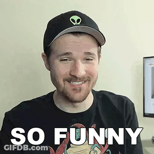 Man In Hat And T-Shirt Saying So Funny GIF