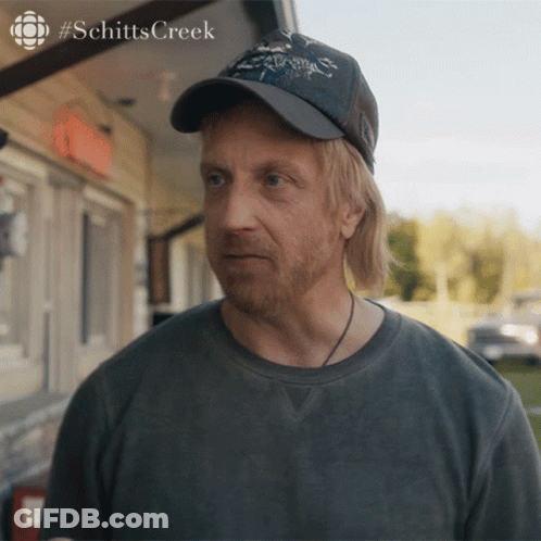 Man In Hat And T-Shirt With Schitts Creek GIF