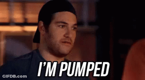 Man In Hat And Tank Top Next To Man In Suit And Tie GIF