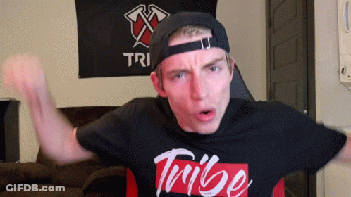 Man In Hat And Tribe Shirt GIF