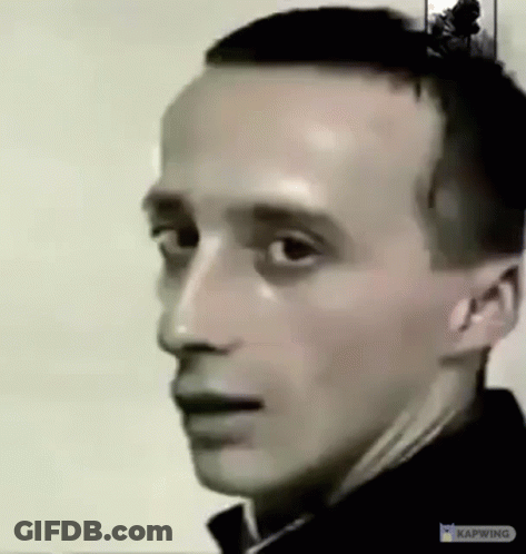 Man In Hat And Turtleneck On Momento App GIF