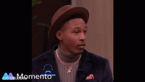 Man In Hat And Turtleneck GIF