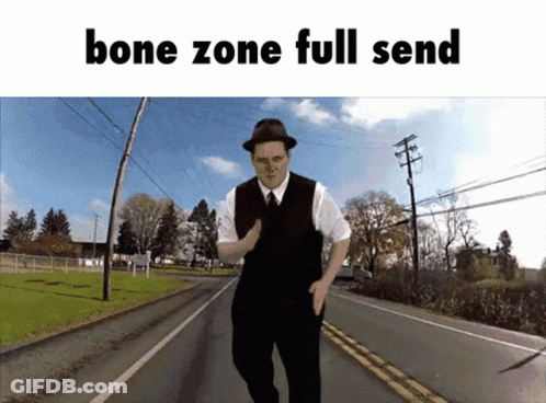 Man In Hat And Vest Walking Down Road Bone Zone Full Send GIF