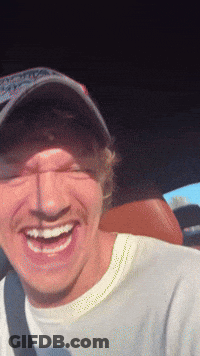 Man In Hat And White Shirt Smiling GIF