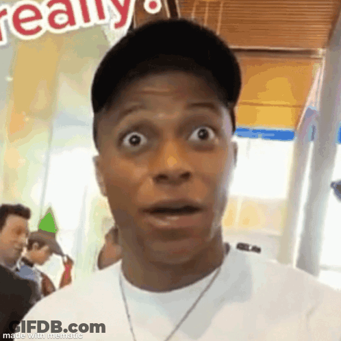 Man In Hat And White T-Shirt Making Funny Face GIF