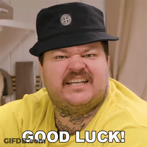 Man In Hat And Yellow Shirt Saying Good Luck GIF
